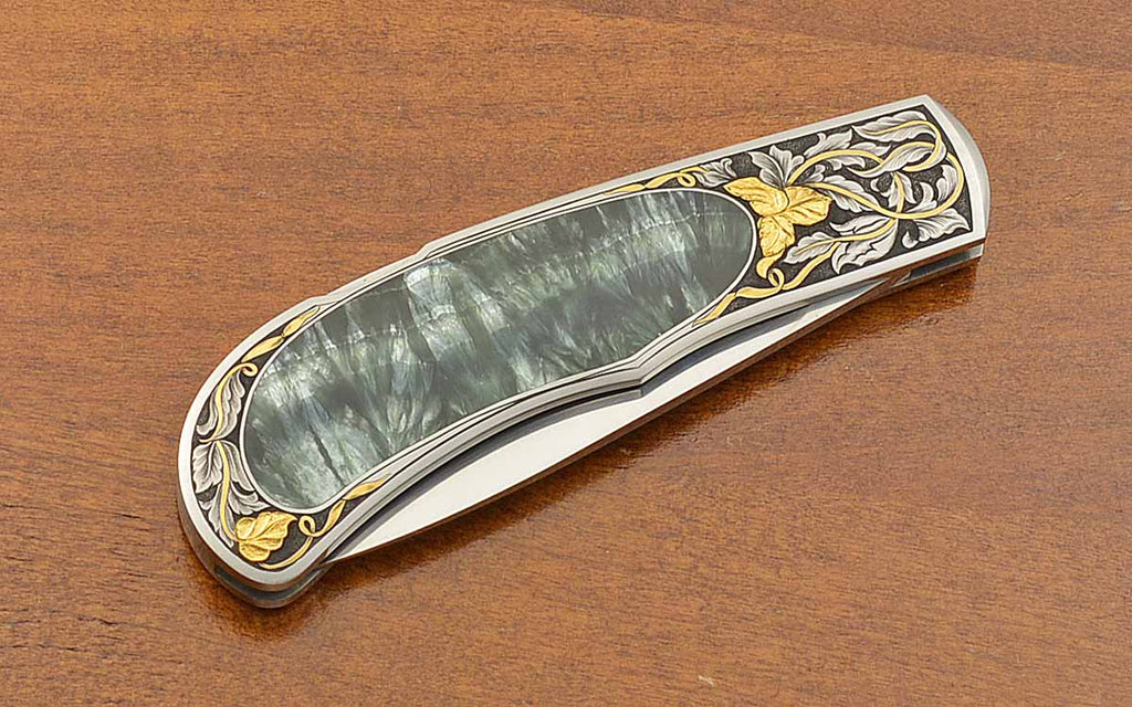 Interframe Lock Blade Folder