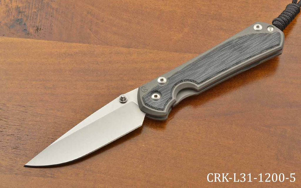 Pre-Owned Large Sebenza 31 Drop Point Black Canvas Inlay MagnaCut