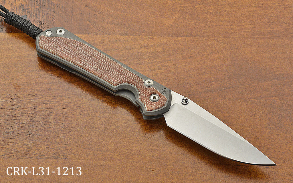 Large Sebenza 31 Drop Point Natural Canvas Inlay Left Hand MagnaCut