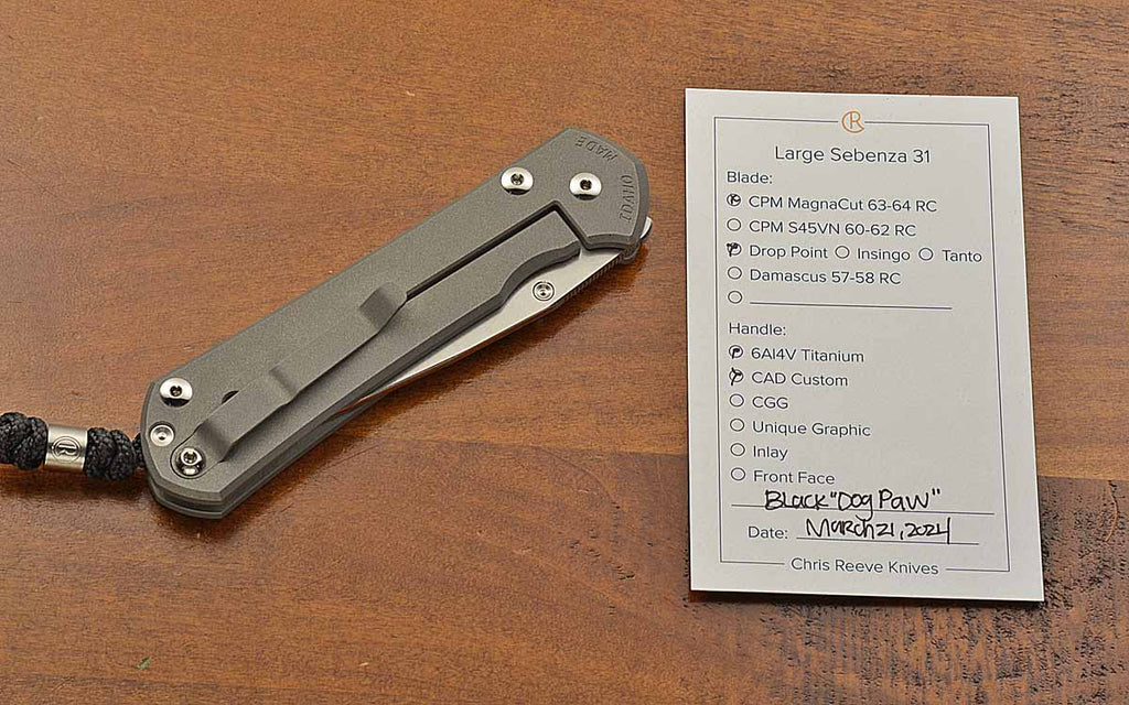Large Sebenza 31 Drop Point Black Dog Paw Graphic