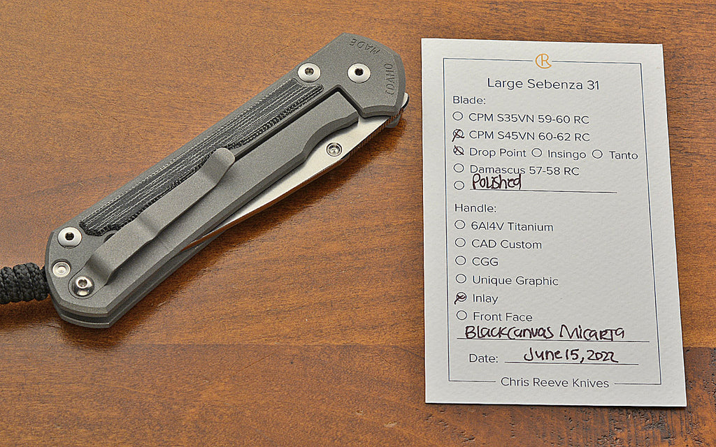 Pre-Owned Large Sebenza Polished 31 Drop Point Black Canvas Inlay