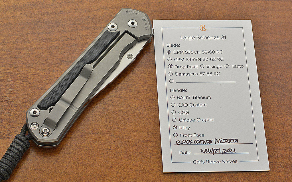 Pre-Owned Large Sebenza 31 Drop Point Black Canvas Inlay