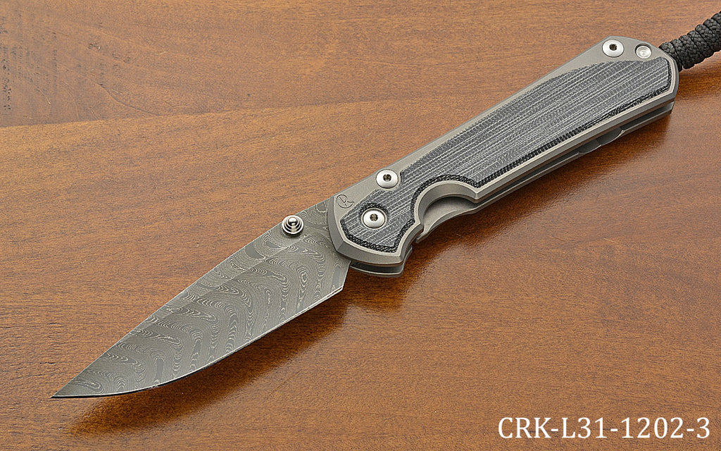 Pre-Owned Large Sebenza 31 Boomerang Damascus Black Canvas Inlay