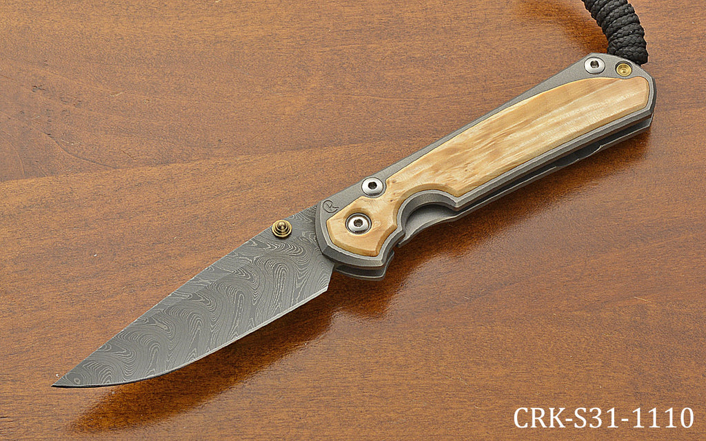 Small Sebenza 31 Drop Point Boomerang Damascus Box Elder Inlay
