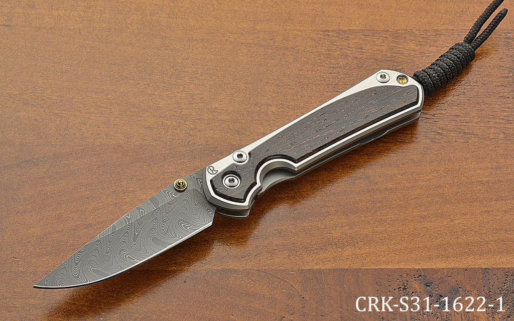 Pre-Owned Small Sebenza 31 Drop Point Boomerang Damascus Bog Oak Inlay