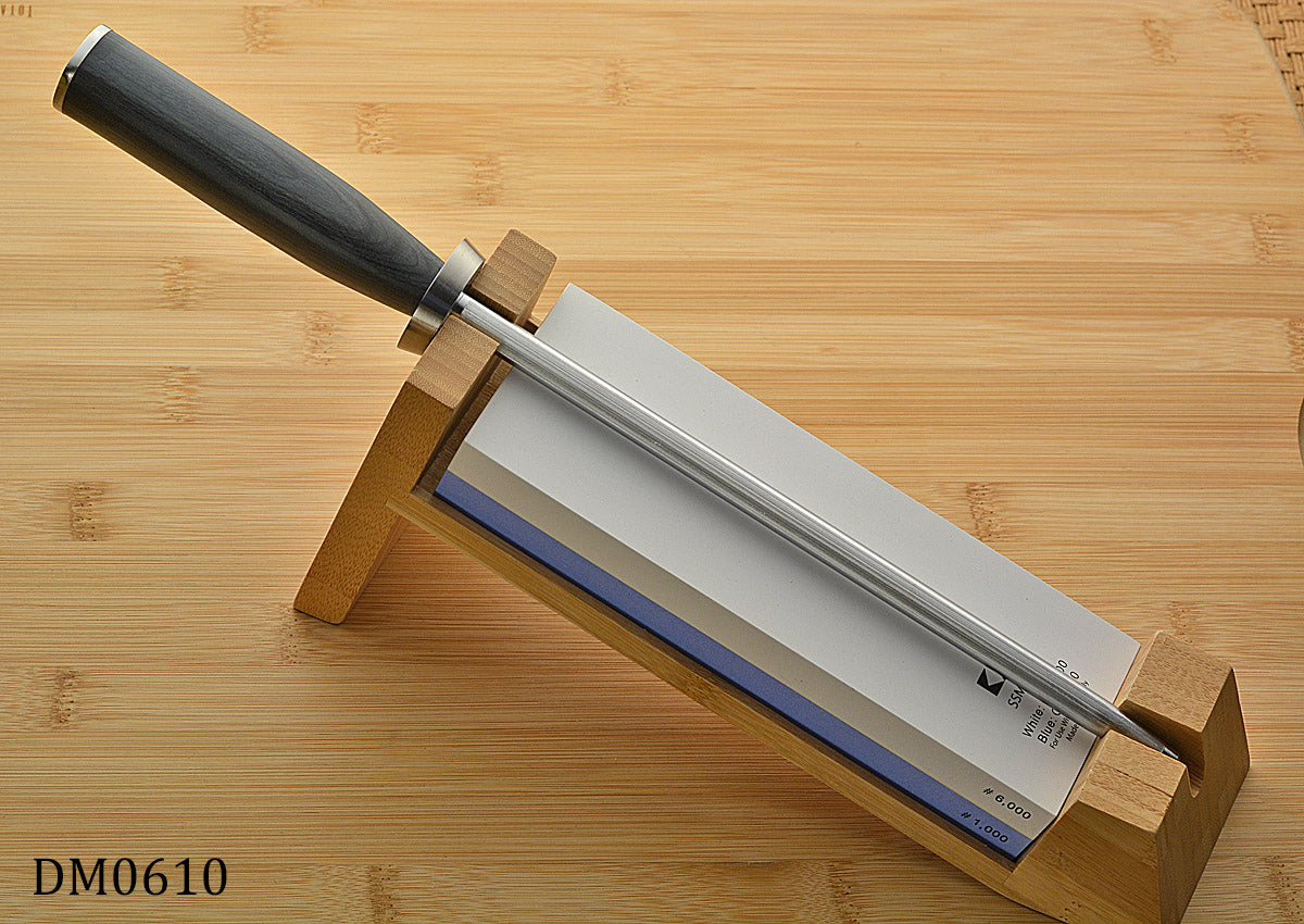 Sharpening a Shun knife on a whetstone 